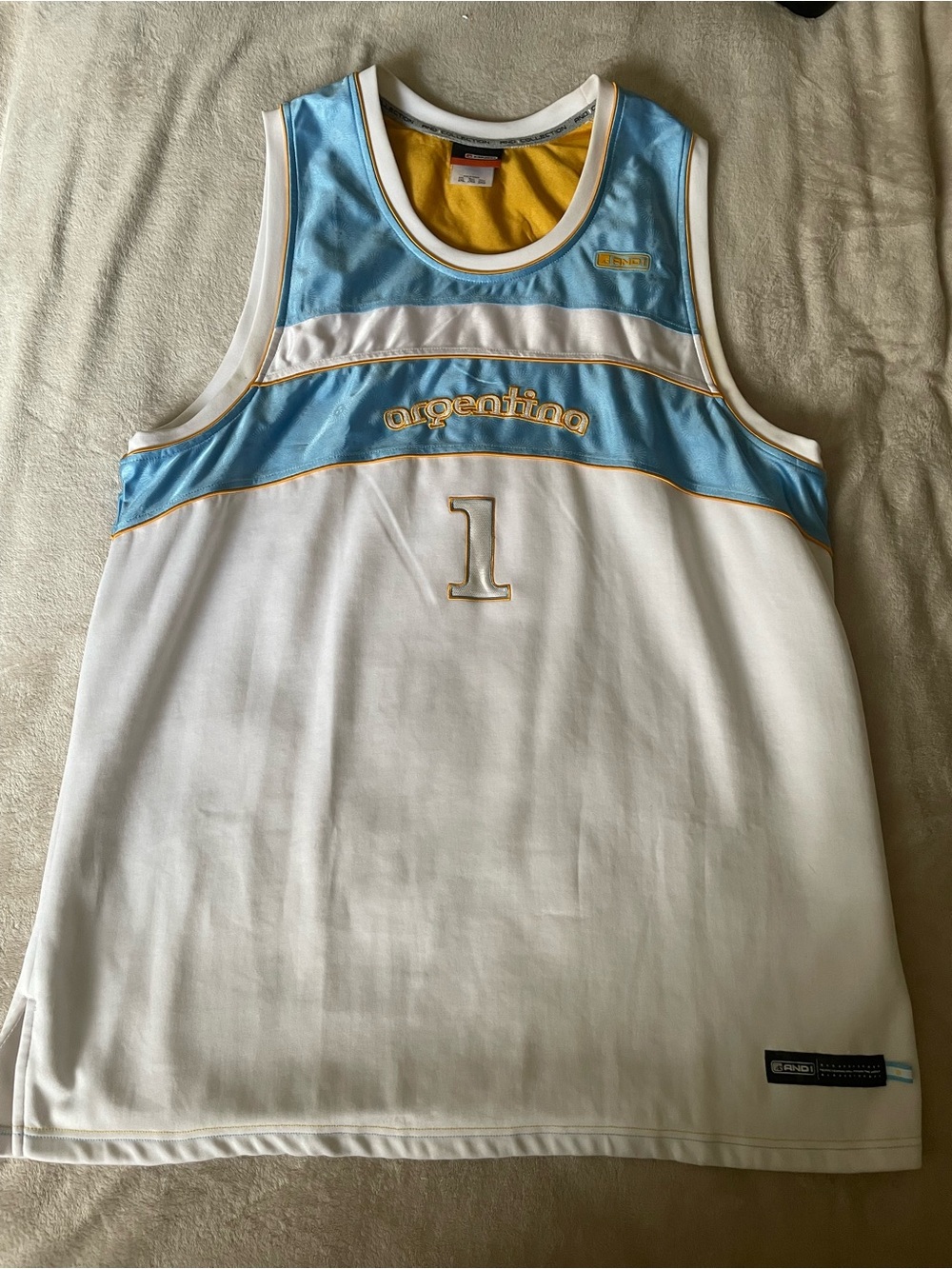 RARE And1 White Basketball Jersey with Light Blue & Gold Accents